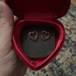 Heart shape, red stone earrings without the backs, not real silver just costume.
